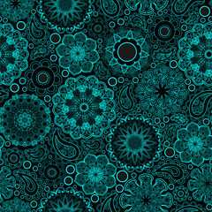 Seamless floral pattern, hand drawn, vector. Boho style ornamental pattern, blue line art pattern on black background.