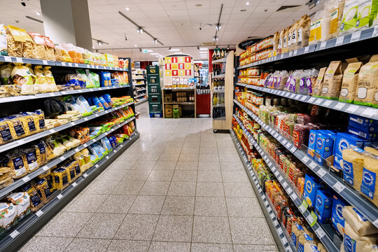 26 July 2022, Munster, Germany: Cereals, pasta and other long-term storage products in the supermarket