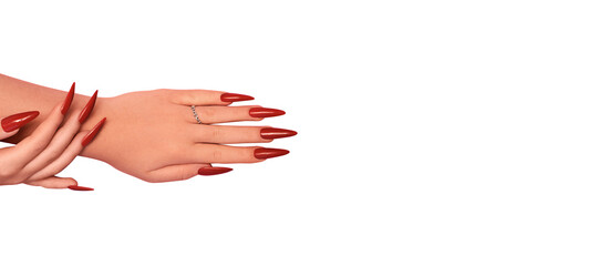 Female hands with red stiletto nails design. Glitter red nail polish manicure. Female hands with...