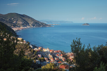 View of the coastal towns on the Italian Riviera from the mountain on a summer's day. Laigueglia and Alassio on Italian Riviera, Liguria, Italy