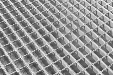 Iron metal industrial grid with a seamless rectangular pattern. Square cells. Black and white background texture