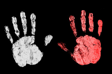 Poland flag color. Polish nation. Stop sign background. Open hand paint imprint. Symbolic gesture of STOP. One hand supporting another. Palm isolated on black.