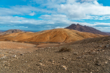 Panoramic view of rocky, harsh mountains. Astronomical viewpoint Sicasumbre area in Fuerteventura islands (Spain)