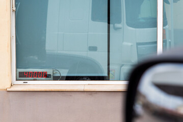 Screen of a scale for trucks indicating 40,000 kilograms of weight, the maximum allowed to...