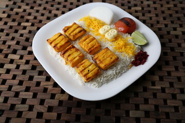 Jojah Kabab rice or Jojah served in a dish isolated on table side view of middle east food