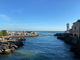 marina and lighthouse in cascais
