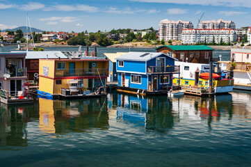 Fototapeta na wymiar Boat houses at Fisherman wharf in Victoria, BC, Canada