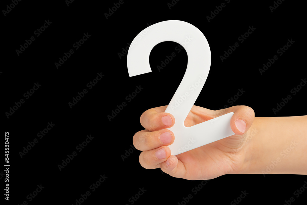 Aufkleber number two in hand isolated on black background. Number two white in a child's hand on a black background. For inserting into a project or design.