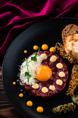 Beef tartare with red onion toast bread
