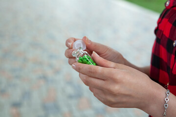 girl holding pills in her hands