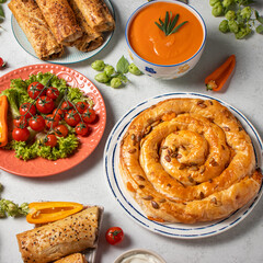 set of borek (burek) vertuta snail on served table. Autumn decoration
