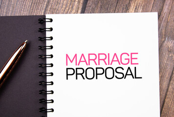 Marriage proposal - text concept on notepad.Preparing to make a marriage proposal.