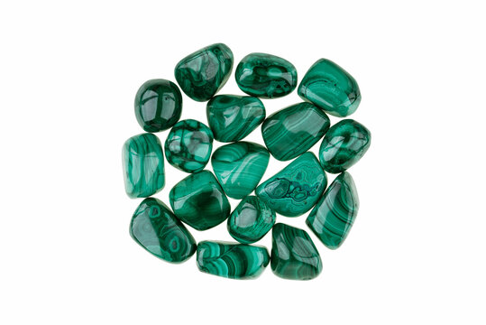 Closeup of beautiful green Malachite tumbled stones isolated on white