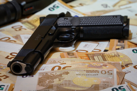 gun and money