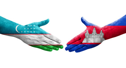 Handshake between Uzbekistan and Cambodia flags painted on hands, isolated transparent image.