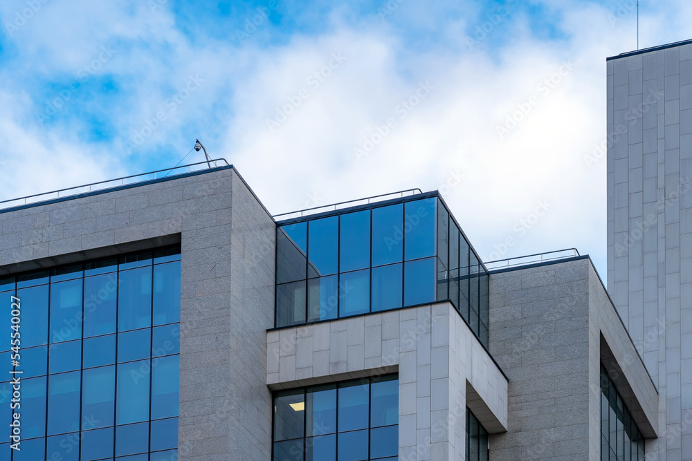 Poster abstract modern business architecture. fragment of modern architecture, walls made of glass and conc