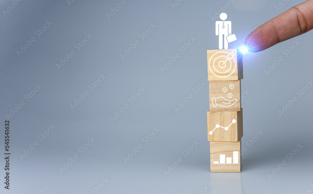 Poster hand pointing at one wood cube block with target icon . concept of business strategy and goal action