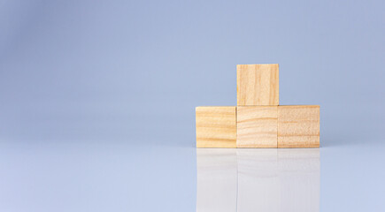 empty wooden blocks lined up on a white background. Business concept.