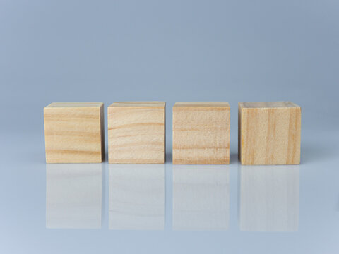 Empty Wooden Blocks Lined Up On A White Background. Business Concept.