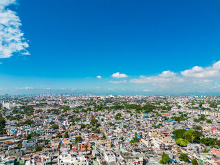 Aerial panoramic cityscape of Santo Domingo, Dominican Republic. Latin American city by the sea