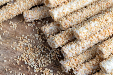 waffle tube with chocolate filling and crushed peanuts