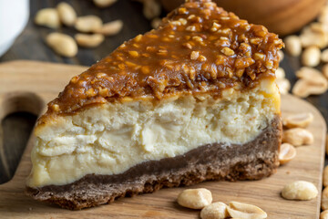 Cheesecake made of dairy products and peanuts in caramel