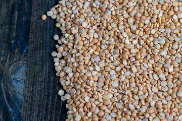 Raw, dry and not cooked porridge of peas on the table