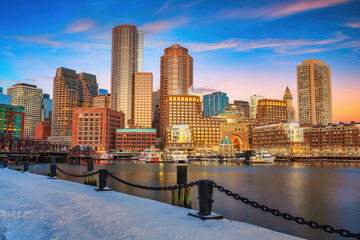 Fototapeta premium Boston skyline, financial district and harbor at sunrise in winter, Boston, MA, USA