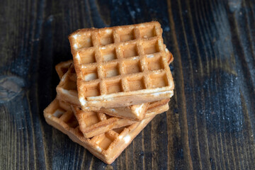 square sweet soft waffles on the table