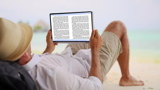 Man Reading E-book On Tablet