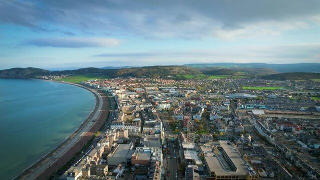 Llandudno, Wales. Aerial view over the seaside town with Victorian Pier and Irish Sea shore.