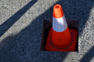 construction cone posted over tripping hazard
