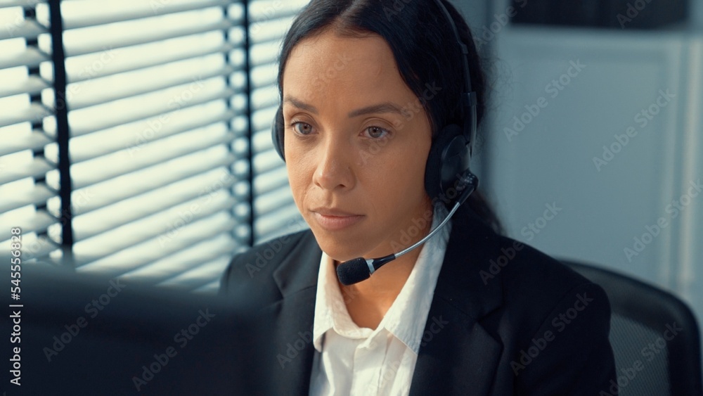 Aufkleber competent female operator working on computer and talking with clients. concept relevant to both cal