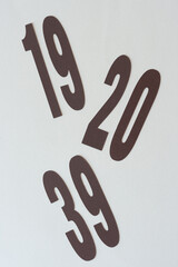 paper background with numbers 19, 20, and 39