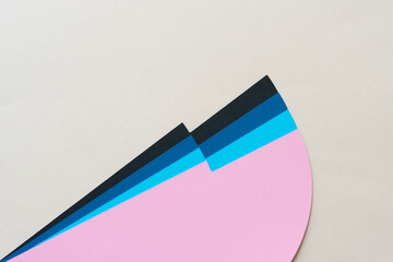 paper background with pink, blue, and black element