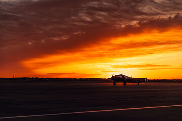 Sunrise on the tarmac, break of dawn at the airport