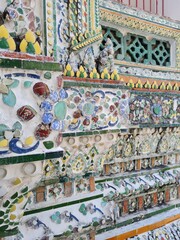 BANGKOK,THAILAND-12 NOV 2022: pattern detail of pagoda at Wat Arun, The temple of Dawn.Wat Arun is a Buddhist temple in Bangkok.Wat Arun is among the best known of Thailand's landmark. 