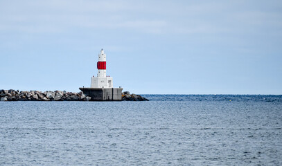 Fototapeta na wymiar Presque Isle Harbor Breakwater Lighthouse on the Michigan Coastline