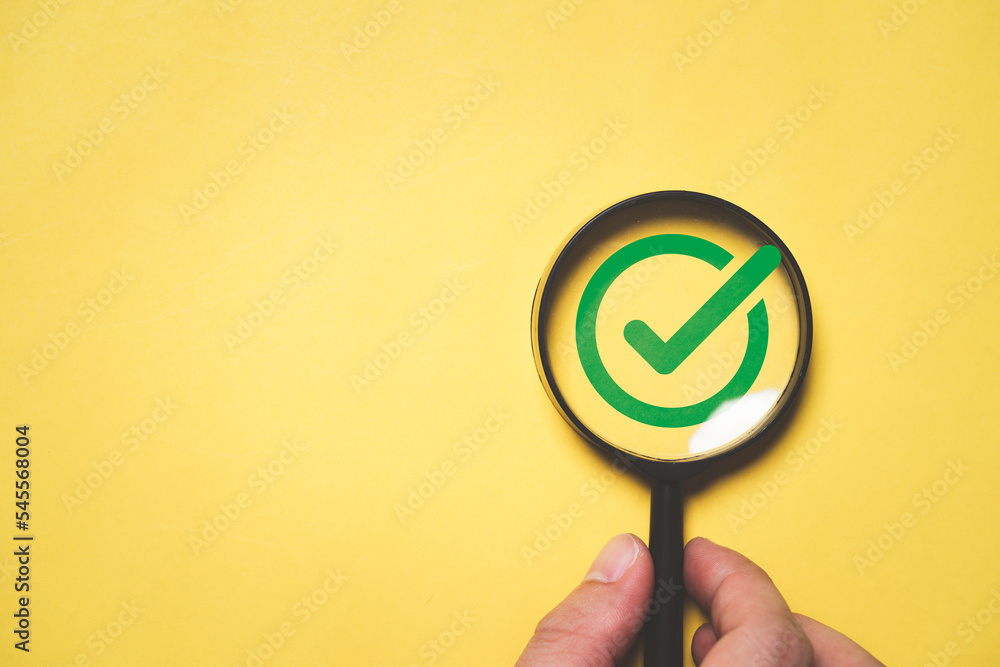 Poster green correct or tick sign mark inside of magnifier glass for focus approve document and project con