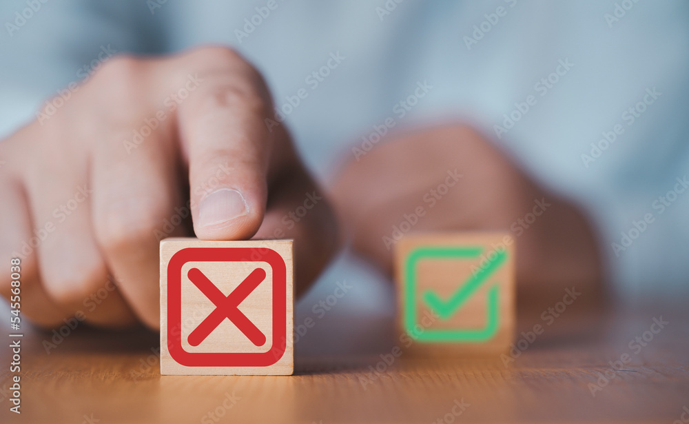 Poster hand push red red cross mark to choose cancellation item , approve and reject business and document 