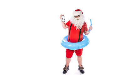 Vacation and holidays. Funny Santa Claus posing with an inflatable ring on a white background. Merry Christmas.