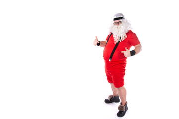 Funny Santa Claus goes in for sports. Man posing on a white background.