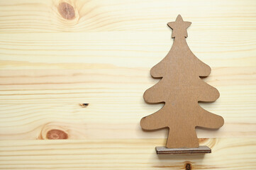 wooden christmas tree on table, celebration design