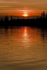 Fototapeta premium sunset over the lake