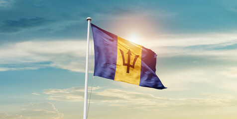 Barbados national flag cloth fabric waving on the sky - Image - obrazy, fototapety, plakaty
