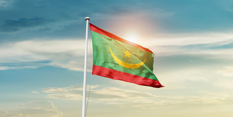 Mauritania national flag cloth fabric waving on the sky - Image