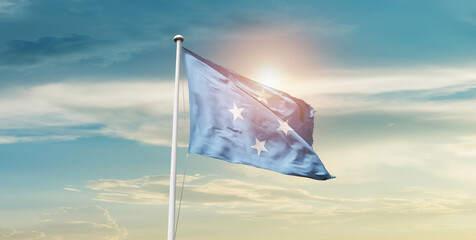 Micronesia national flag cloth fabric waving on the sky - Image