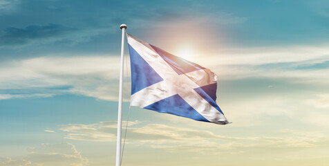 Scotland national flag cloth fabric waving on the sky - Image