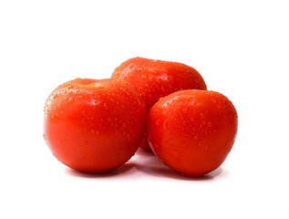 Red ripe tomato with water drops isolated on white background, Solanum lycopersicum