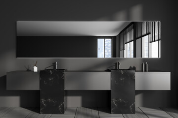 Grey bathroom interior with washbasins and mirror, accessories and window